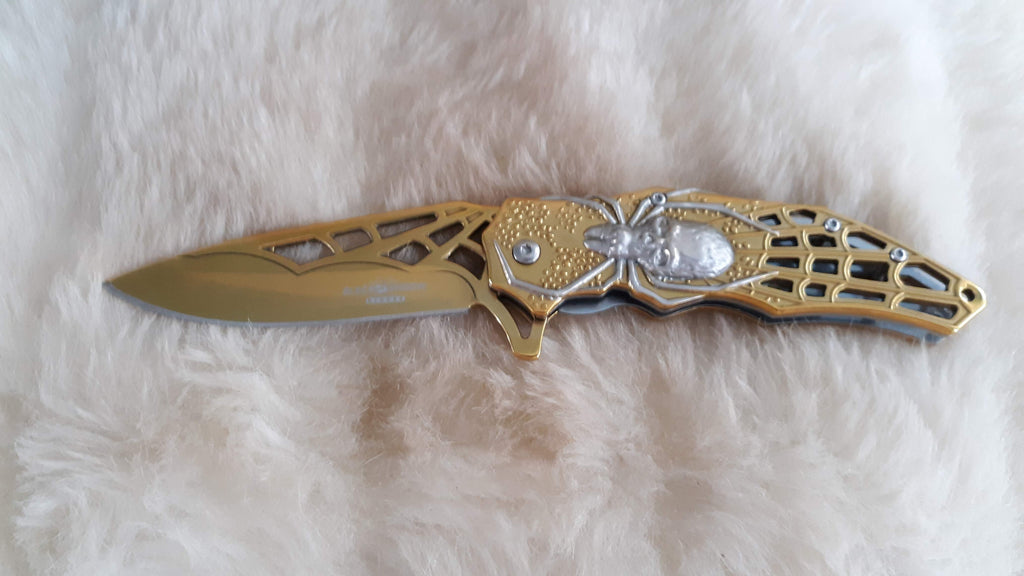 GOLD TITTANIUM COATED POCKET KNIFE W/CAN OPENER – Bama Paracord & More