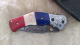 "ALL AMERICAN" DAMASCUS CAMEL BONE FOLDER W/CROSS DRAW SHEATH