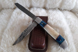 "DOUBLE TROUBLE" DAMASCUS CAMEL BONE/WOOD FOLDER